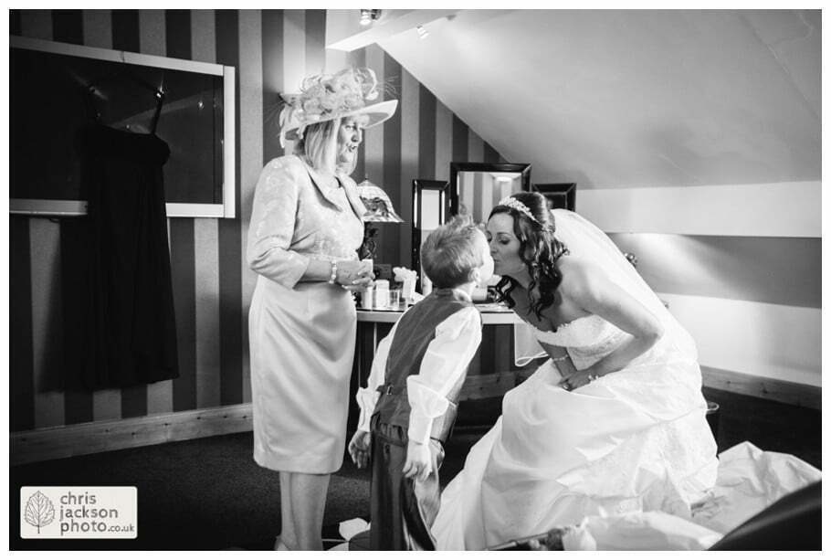 bridal preparations getting ready mother of the bride bride kiss son page boy wedding photographer gibbon bridge hotel Chris and Hazel Wedding Photography Cheryl Menzies & Simon Hopley Cheryl Hopley