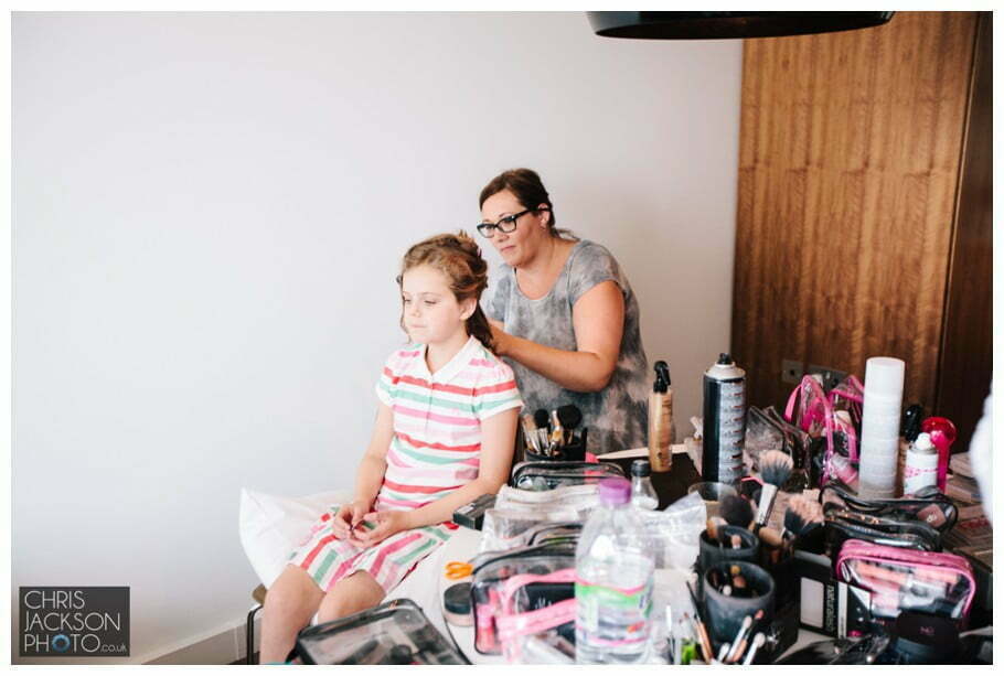 Doubletree by Hilton Wedding Photographer Leeds City Centre Wedding by Chris & Hazel Wedding photography - Tina & Sam 011 little girl having hair and make up done