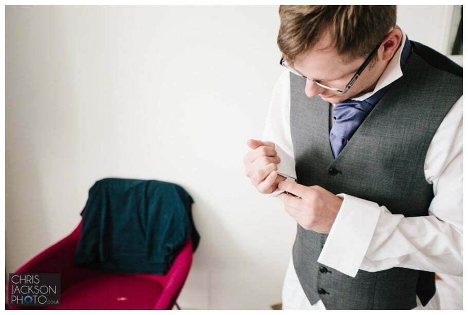 Doubletree by Hilton Wedding Photographer Leeds City Centre Wedding by Chris & Hazel Wedding photography - Tina & Sam 022 groom cufflinks, fastening groom cufflinks, leeds wedding photography groom