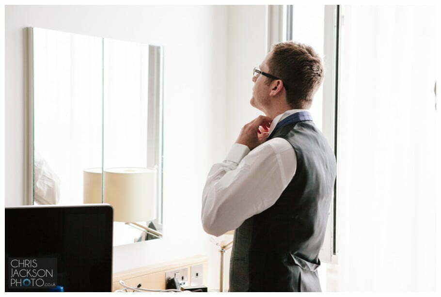 Doubletree by Hilton Wedding Photographer Leeds City Centre Wedding by Chris & Hazel Wedding photography - Tina & Sam 024 groom finishing touches getting ready preparations