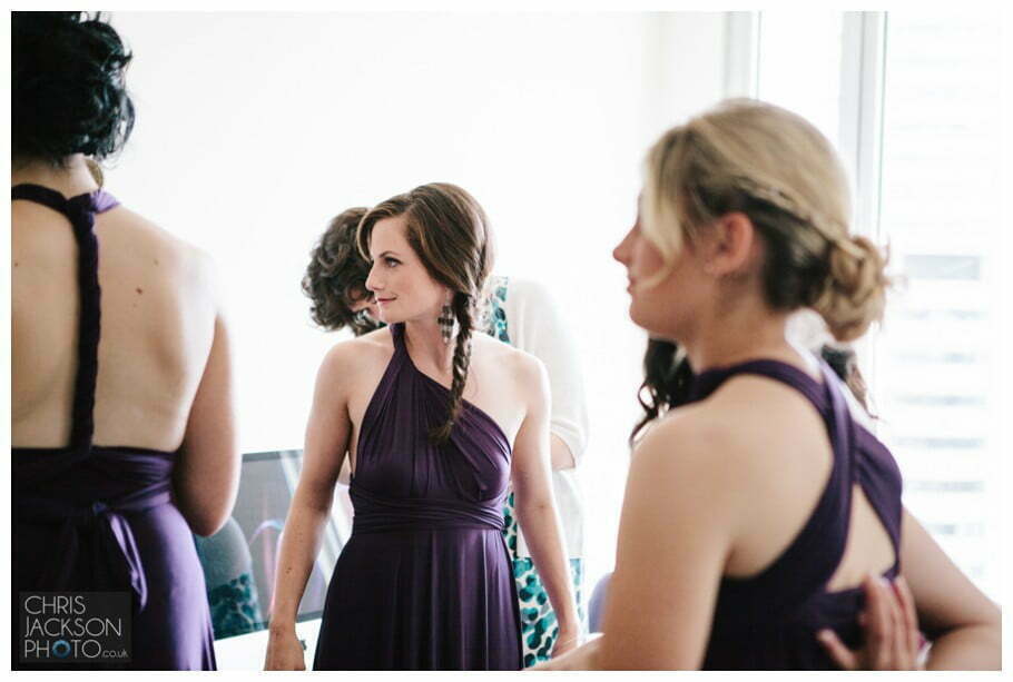 Doubletree by Hilton Wedding Photographer Leeds City Centre Wedding by Chris & Hazel Wedding photography - Tina & Sam 030 bridesmaids, tying back of bridesmaids dress,