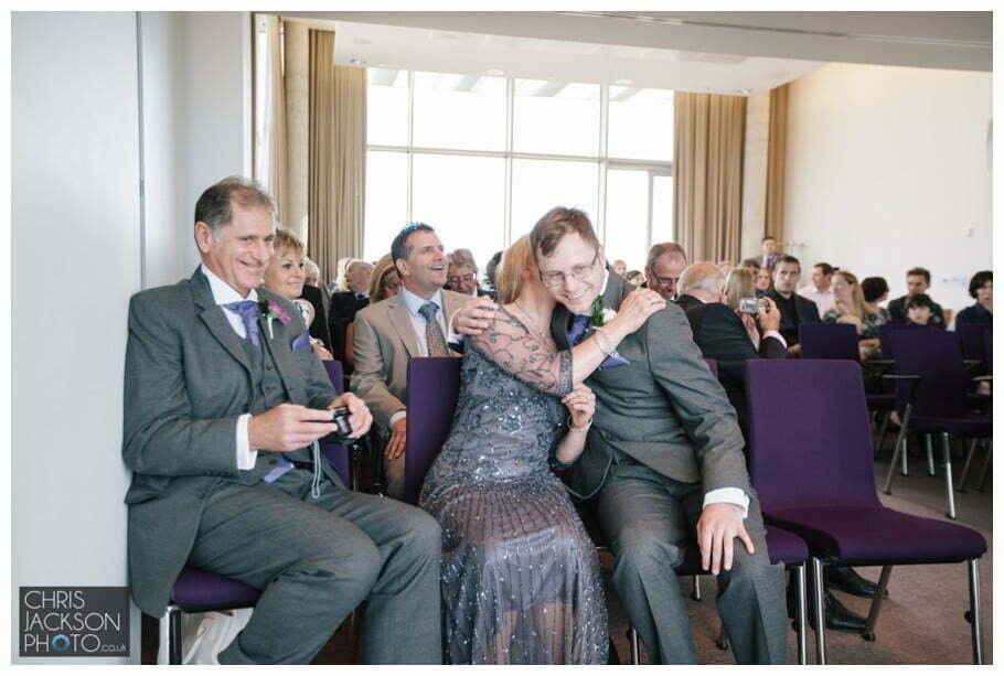 Doubletree by Hilton Wedding Photographer Leeds City Centre Wedding by Chris & Hazel Wedding photography - Tina & Sam 044 mother of groom at altar, mother of groom hug groom,