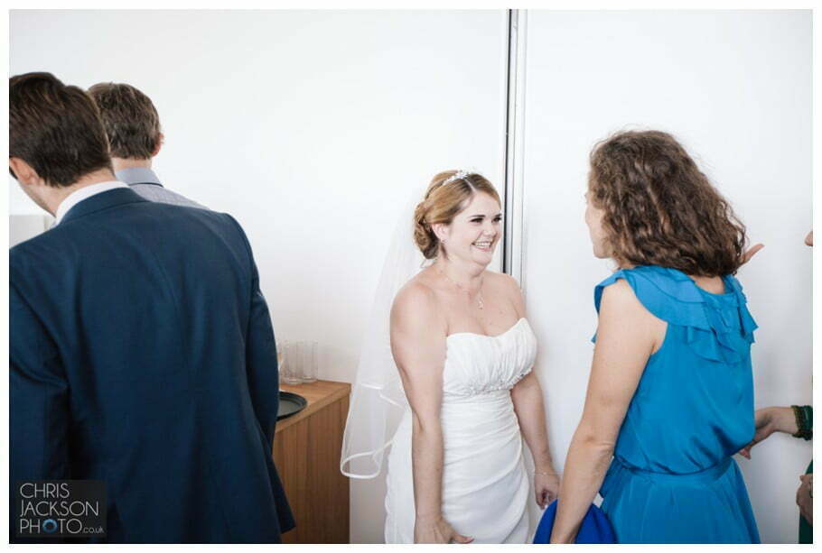 Doubletree by Hilton Wedding Photographer Leeds City Centre Wedding by Chris & Hazel Wedding photography - Tina & Sam 076 bride congratulations at wedding guest