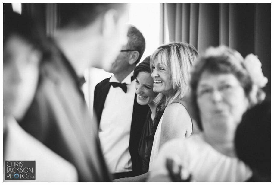 Doubletree by Hilton Wedding Photographer Leeds City Centre Wedding by Chris & Hazel Wedding photography - Tina & Sam 079 guests being photographed at wedding reaction documentary wedding photography