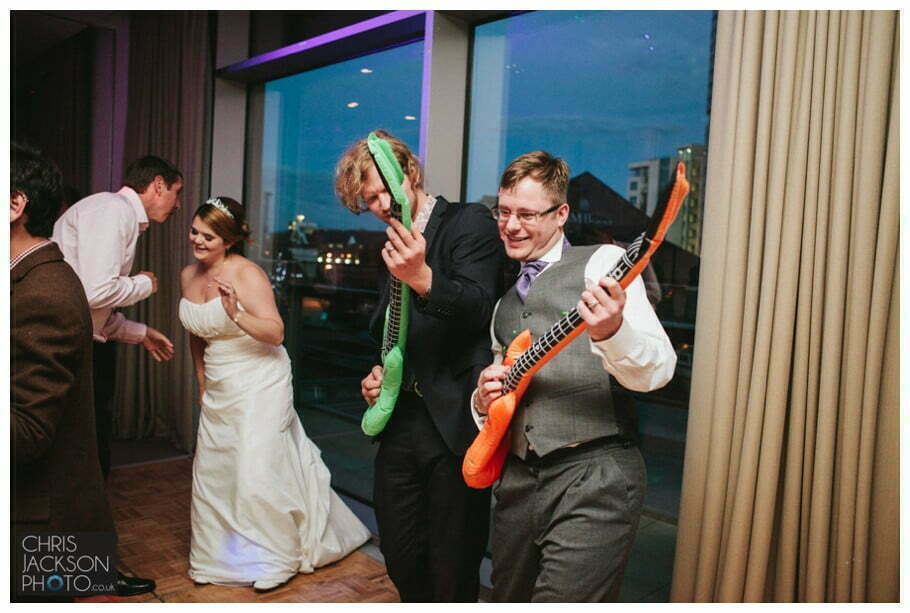 Doubletree by Hilton Wedding Photographer Leeds City Centre Wedding by Chris & Hazel Wedding photography - Tina & Sam 162 bride groom guests dancing dance floor wedding photography leeds doubletree by hilton