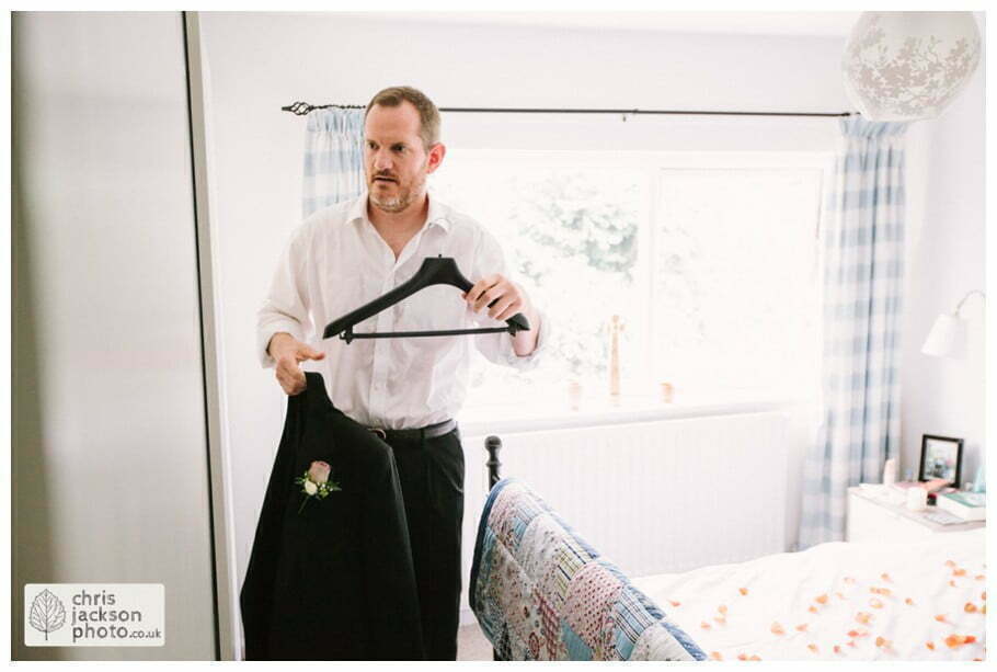 York Castle Museum Wedding Photographer York - Chris & Hazel Wedding Photography - Rory Dalgliesh & Rebecca Weinkauf 016 groom prep preparations getting ready suit putting on documentary york wedding photographer chris and hazel wedding photography