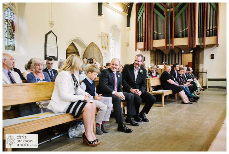 York Castle Museum Wedding Photographer York - Chris & Hazel Wedding Photography - Rory Dalgliesh & Rebecca Weinkauf 034 groom sat church waiting for bride york heslington church wedding day weddings documentary york wedding photographer chris and hazel wedding photography