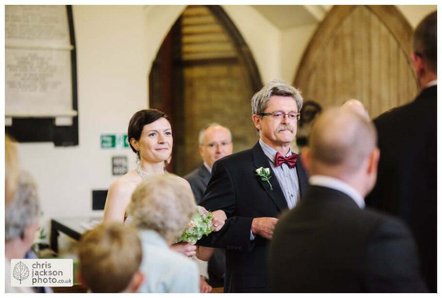York Castle Museum Wedding Photographer York - Chris & Hazel Wedding Photography - Rory Dalgliesh & Rebecca Weinkauf 041 bride walking down aisle isle with father york heslington church wedding day weddings documentary york wedding photographer chris and hazel wedding photography