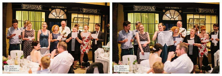 York Castle Museum Wedding Photographer York - Chris & Hazel Wedding Photography - Rory Dalgliesh & Rebecca Weinkauf 136 family singing wedding breakfast old victorian street set wedding venue york castle museum wedding photography wedding photographer York chris & hazel wedding photography