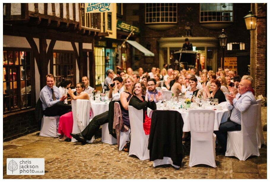York Castle Museum Wedding Photographer York - Chris & Hazel Wedding Photography - Rory Dalgliesh & Rebecca Weinkauf 142 bride and groom first dance guests watch watching looking old victorian street set wedding venue york castle museum wedding photography wedding photographer York chris & hazel wedding photography