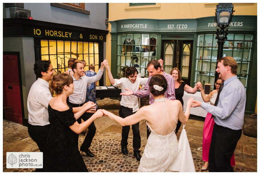 York Castle Museum Wedding Photographer York - Chris & Hazel Wedding Photography - Rory Dalgliesh & Rebecca Weinkauf 147 bride and groom dancing dance guests dance old victorian street set wedding venue york castle museum wedding photography wedding photographer York chris & hazel wedding photography
