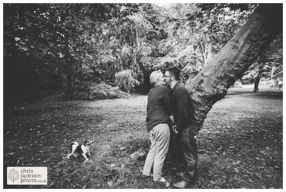 manchester Engagement Session Stamford Park ashton under lyne pre wedding photography couple forest trees woodland kissing chris and hazel wedding photography