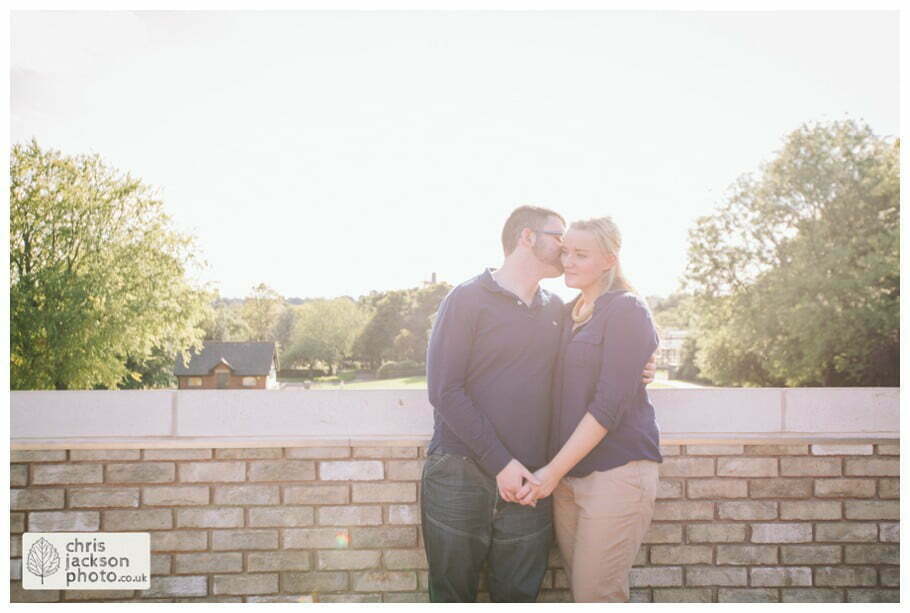 manchester Engagement Session Stamford Park pavilion roof top ashton under lyne pre wedding photography couple sun lens flare chris and hazel wedding photography