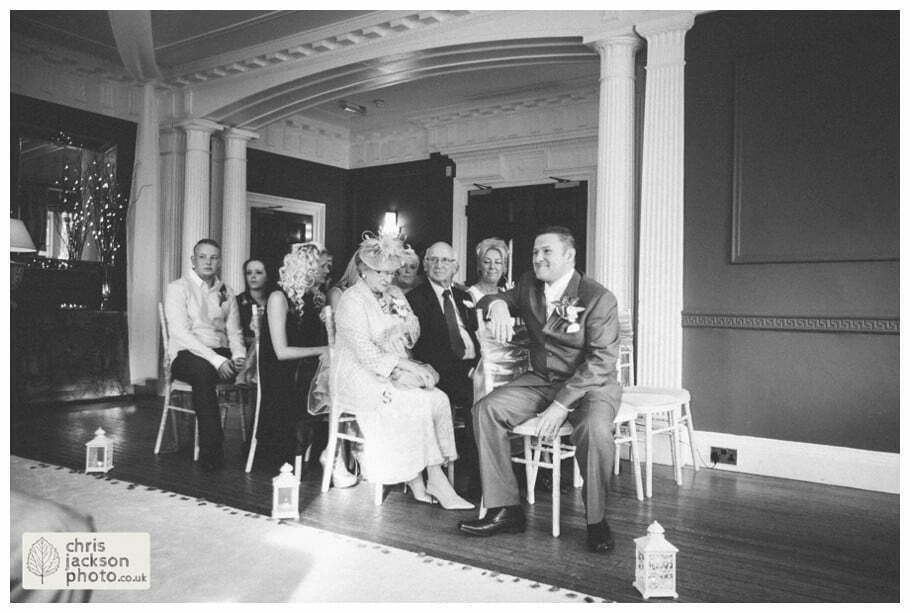 groom waiting for bride wedding ceremony room ballroom documentary reportage Eaves Hall Wedding Photographer Lancashire Clitheroe Wedding Photography by Chris & Hazel Wedding Photography - Steph Blight Steph Duxbury & Iain Duxbury