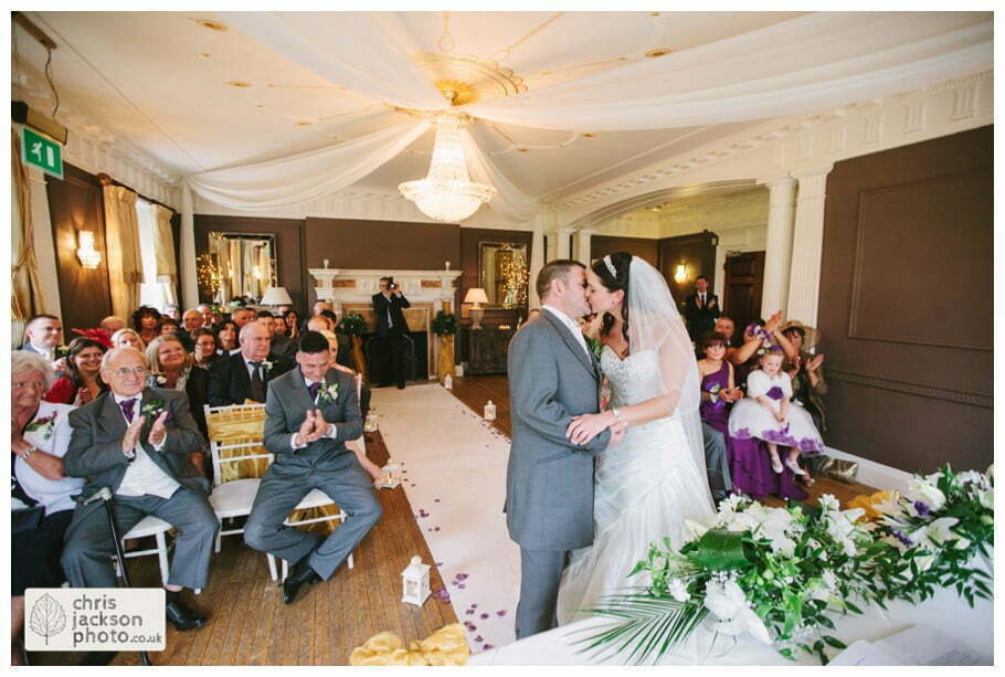 first kiss as bride and groom bride and groom wedding ceremony wedding ceremony room ballroom documentary reportage Eaves Hall Wedding Photographer Lancashire Clitheroe Wedding Photography by Chris & Hazel Wedding Photography - Steph Blight Steph Duxbury & Iain Duxbury
