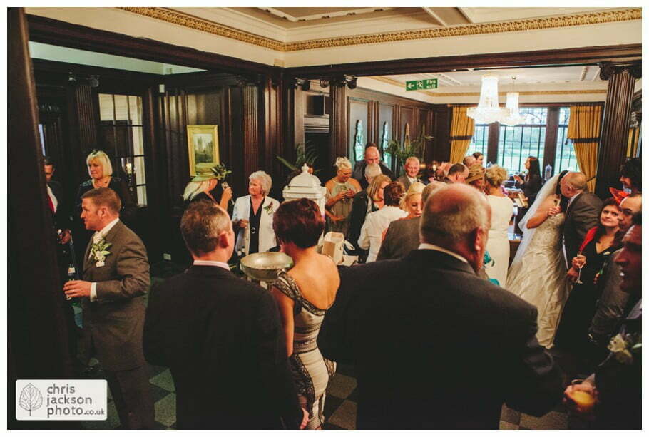 wedding reception guests mingling drinks reception canapes documentary reportage Eaves Hall Wedding Photographer Lancashire Clitheroe Wedding Photography by Chris & Hazel Wedding Photography - Steph Blight Steph Duxbury & Iain Duxbury