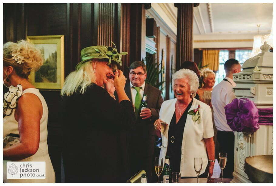 wedding reception guests mingling drinks reception canapes documentary reportage Eaves Hall Wedding Photographer Lancashire Clitheroe Wedding Photography by Chris & Hazel Wedding Photography - Steph Blight Steph Duxbury & Iain Duxbury