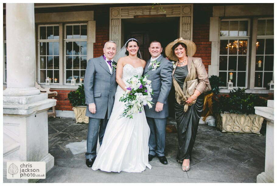 bride and groom and brides parents formal wedding photograph outside Eaves Hall Wedding Photographer Lancashire Clitheroe Wedding Photography by Chris & Hazel Wedding Photography - Steph Blight Steph Duxbury & Iain Duxbury