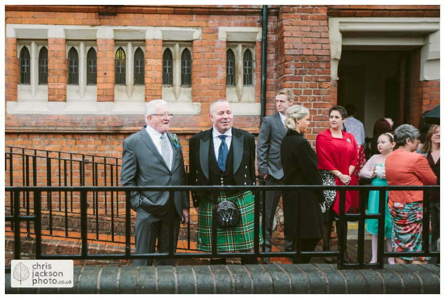 Manchester Wedding Photographer St Anne's Church Wedding Photographer Dukinfield Town Hall Wedding Photography by Chris & Hazel Katrina & John 008 wedding guests outside church St Annes church St. Anne's church openshaw wedding photographer by Manchester Wedding Photographer Chris & Hazel