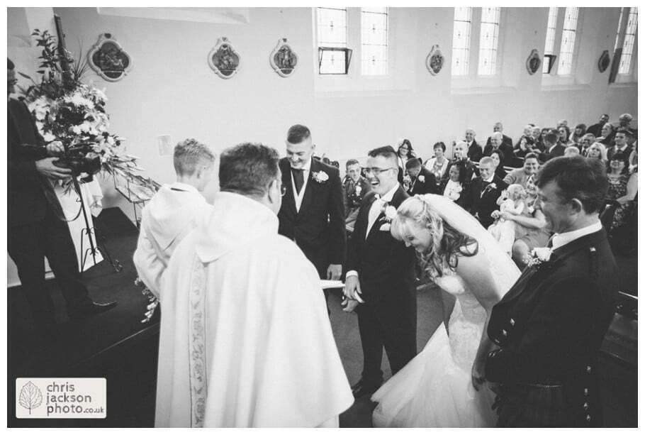 Manchester Wedding Photographer St Anne's Church Wedding Photographer Dukinfield Town Hall Wedding Photography by Chris & Hazel Katrina & John 041 bride and groom exchange rings vows church St Annes church St. Anne's church openshaw wedding photographer by Manchester Wedding Photographer Chris & Hazel