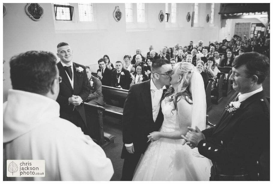 Manchester Wedding Photographer St Anne's Church Wedding Photographer Dukinfield Town Hall Wedding Photography by Chris & Hazel Katrina & John 046 bride and groom first kiss church St Annes church St. Anne's church openshaw wedding photographer by Manchester Wedding Photographer Chris & Hazel