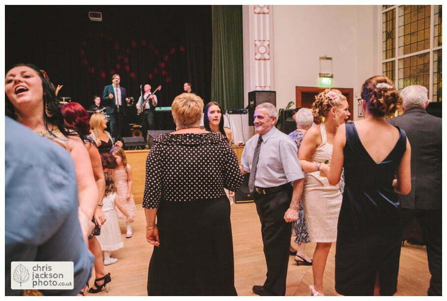 Manchester Wedding Photographer St Anne's Church Wedding Photographer Dukinfield Town Hall Wedding Photography by Chris & Hazel Katrina & John 125 bride and groom dance dancing dance floor guests Dukinfield Town Hall wedding photographer by Manchester Wedding Photographer Chris & Hazel