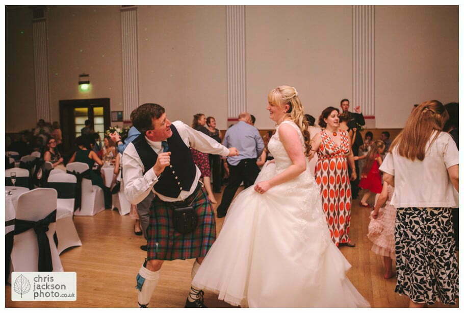 Manchester Wedding Photographer St Anne's Church Wedding Photographer Dukinfield Town Hall Wedding Photography by Chris & Hazel Katrina & John 128 bride and groom dance dancing dance floor guests Dukinfield Town Hall wedding photographer by Manchester Wedding Photographer Chris & Hazel