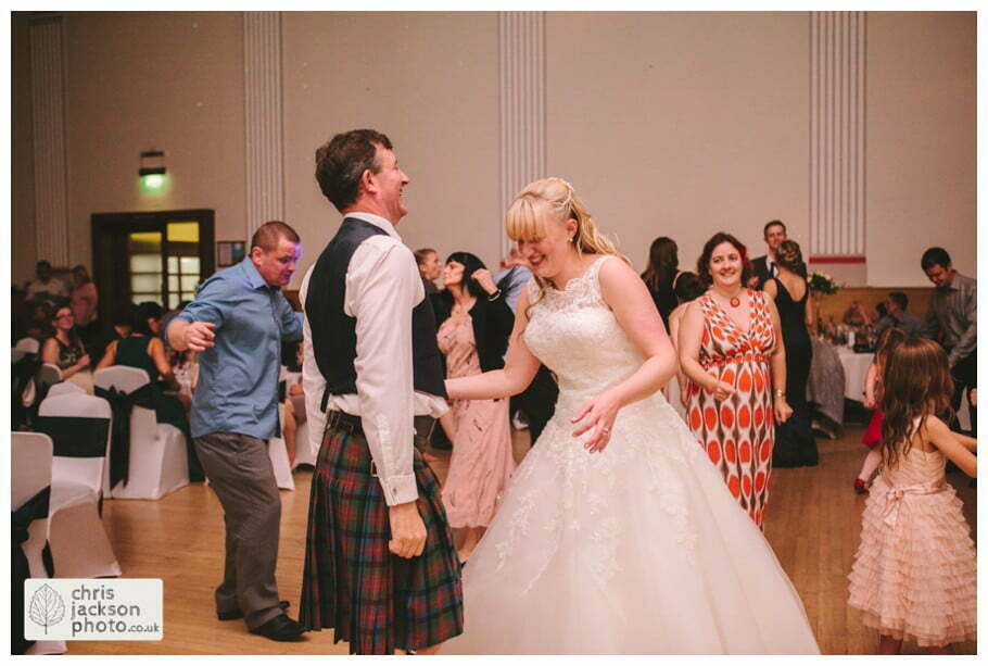 Manchester Wedding Photographer St Anne's Church Wedding Photographer Dukinfield Town Hall Wedding Photography by Chris & Hazel Katrina & John 129 bride and groom dance dancing dance floor guests Dukinfield Town Hall wedding photographer by Manchester Wedding Photographer Chris & Hazel