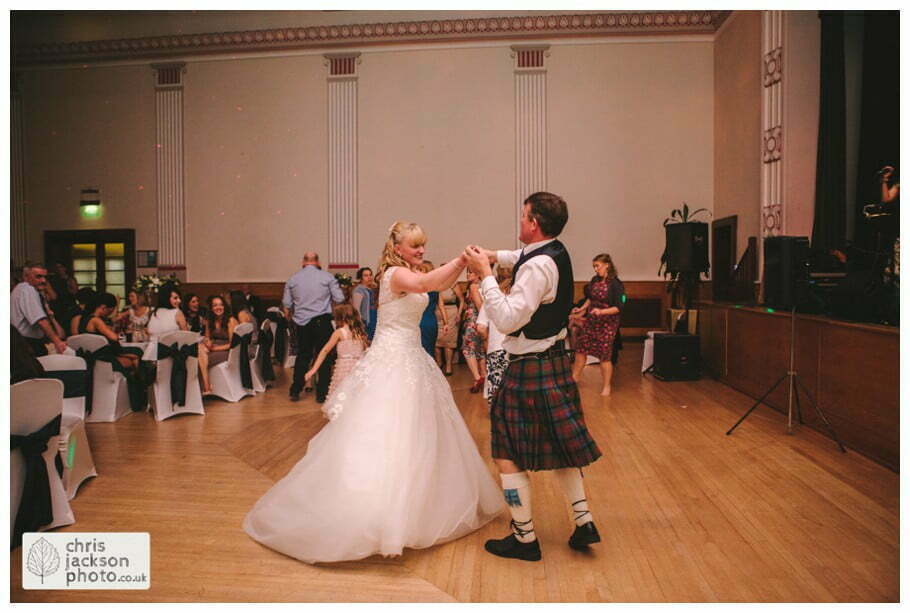 Manchester Wedding Photographer St Anne's Church Wedding Photographer Dukinfield Town Hall Wedding Photography by Chris & Hazel Katrina & John 130 bride and groom dance dancing dance floor guests Dukinfield Town Hall wedding photographer by Manchester Wedding Photographer Chris & Hazel