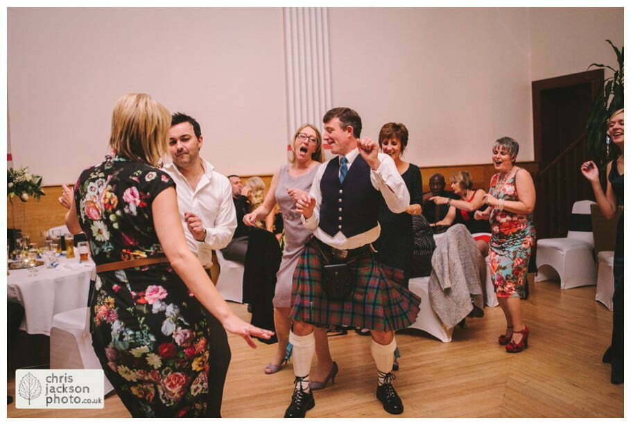 Manchester Wedding Photographer St Anne's Church Wedding Photographer Dukinfield Town Hall Wedding Photography by Chris & Hazel Katrina & John 133 bride and groom dance dancing dance floor guests Dukinfield Town Hall wedding photographer by Manchester Wedding Photographer Chris & Hazel