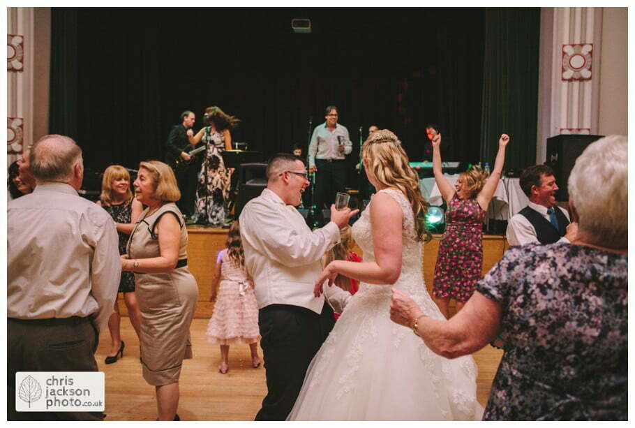 Manchester Wedding Photographer St Anne's Church Wedding Photographer Dukinfield Town Hall Wedding Photography by Chris & Hazel Katrina & John 134 bride and groom dance dancing dance floor guests Dukinfield Town Hall wedding photographer by Manchester Wedding Photographer Chris & Hazel