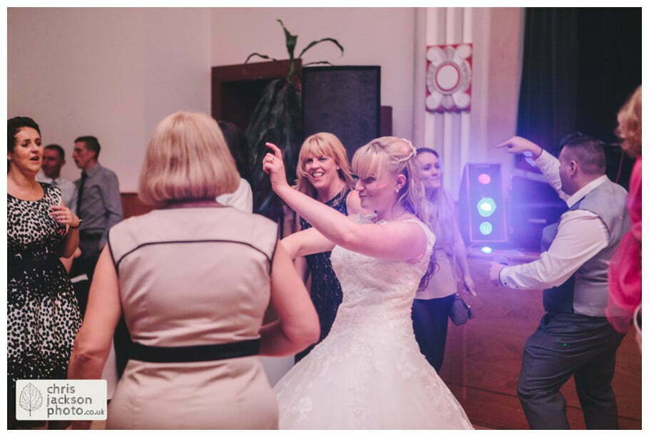 Manchester Wedding Photographer St Anne's Church Wedding Photographer Dukinfield Town Hall Wedding Photography by Chris & Hazel Katrina & John 136 bride and groom dance dancing dance floor guests Dukinfield Town Hall wedding photographer by Manchester Wedding Photographer Chris & Hazel