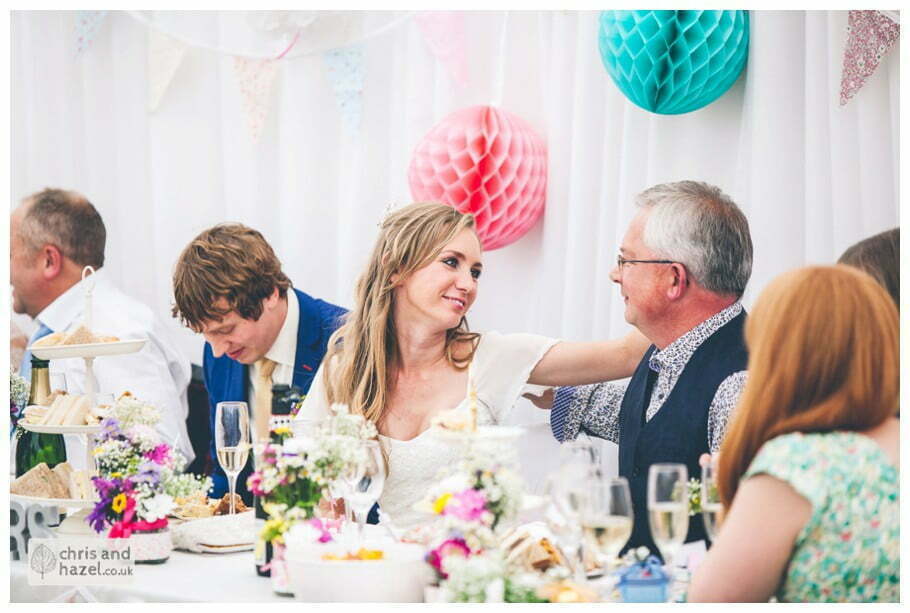 bride kissing hugging father of the bride wedding speech inside The venue at Wimberry hill wedding day diy vintage wedding glossop The venue at wimberry hill glossop wedding photography by Glossop wedding photographers chris and hazel natasha thorley jake rowarth