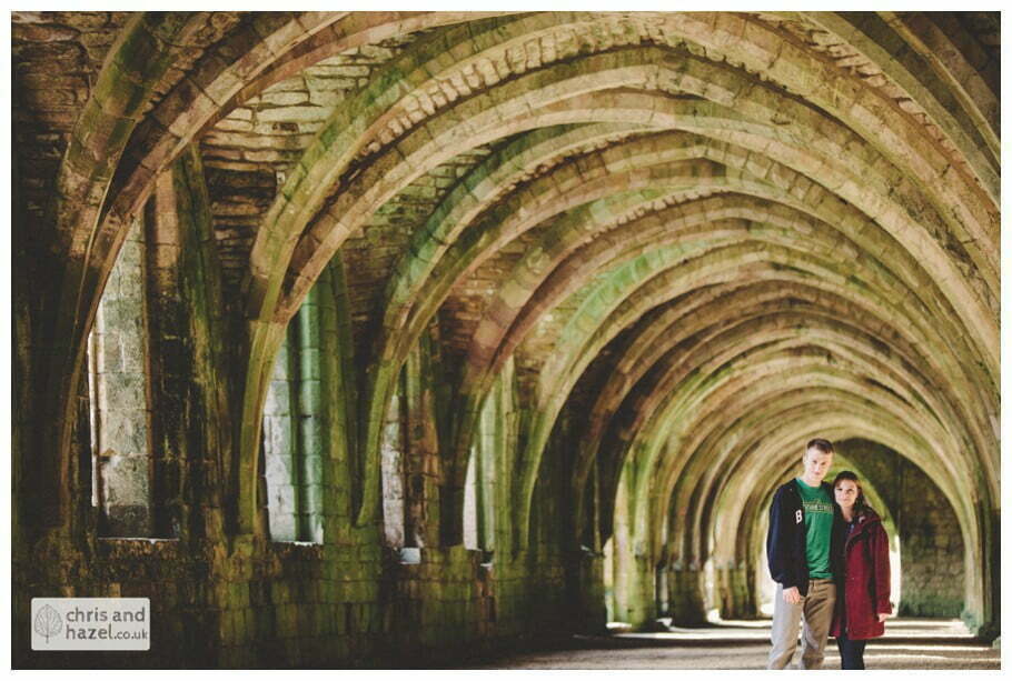 Rippon engagement photography wedding photographer Fountains Abbey yorkshire wedding photographer chris and hazel ruins couple inside fountains abbey ruins ceiling cave