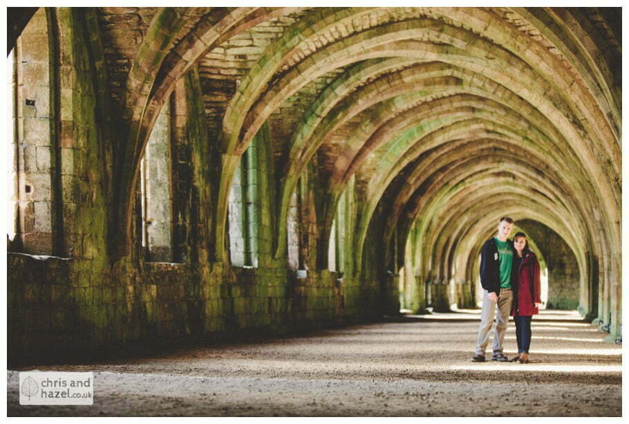 Rippon engagement photography wedding photographer Fountains Abbey yorkshire wedding photographer chris and hazel ruins couple inside fountains abbey ruins ceiling cave