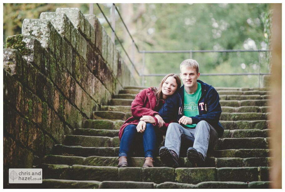 Rippon engagement photography wedding photographer Fountains Abbey yorkshire wedding photographer chris and hazel ruins couple sat on steps inside ruins