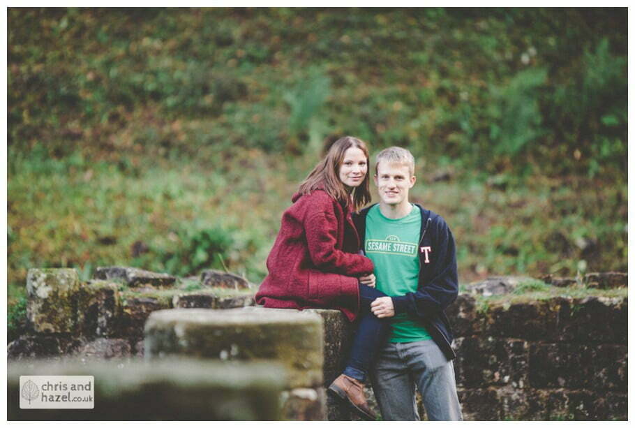 Rippon engagement photography wedding photographer Fountains Abbey yorkshire wedding photographer chris and hazel ruins couple sat on ruins