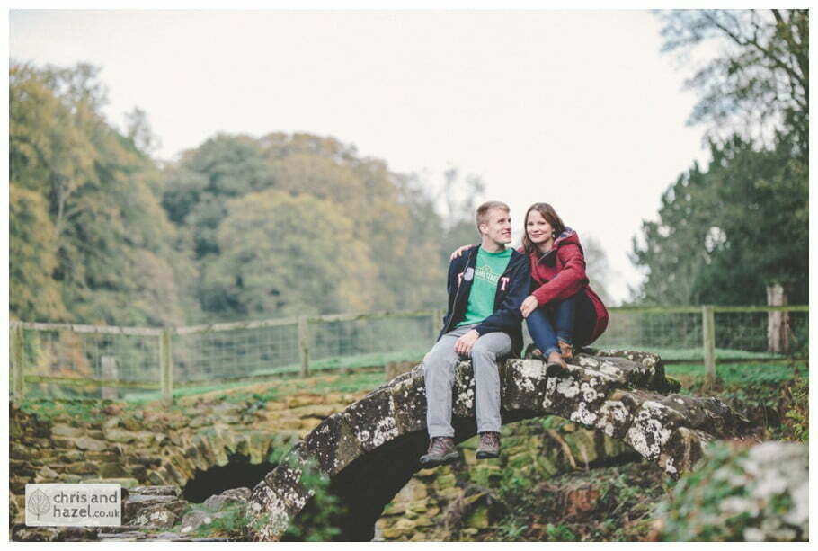 Rippon engagement photography wedding photographer Fountains Abbey yorkshire wedding photographer chris and hazel ruins couple bridge stream