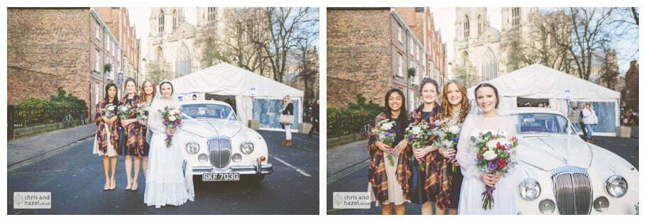 bride and bridesmaids in front of car bridal car york city centre heslington church merchant adventurers hall documentary wedding photography ben frankie wedding photographer heslington church wedding york wedding photography wedding winter chris and hazel wedding photography york