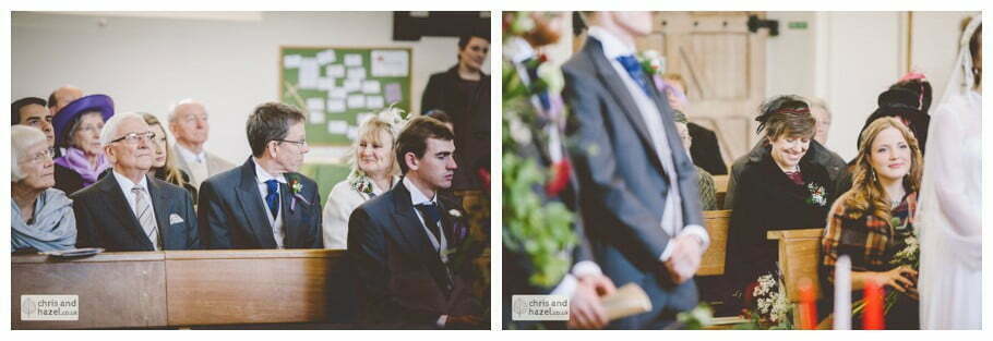 bride and groom parents smiling during ceremony heslington church documentary wedding photography ben rankie wedding photographer heslington church wedding york wedding photography wedding winter chris and hazel wedding photography york