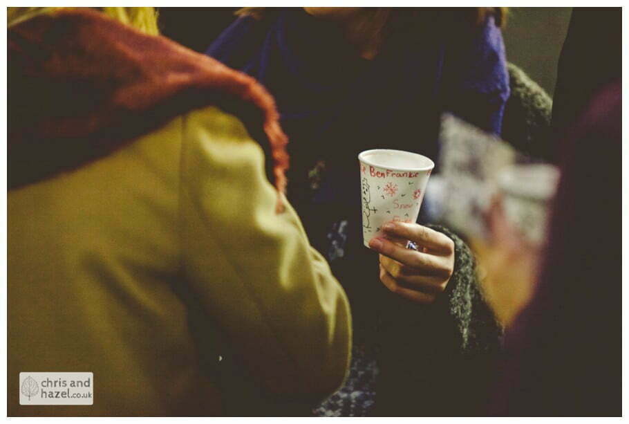guests mingling in church ben frankie bride groom wedding photographer heslington church wedding york wedding photography bride wedding winter chris and hazel wedding photography york