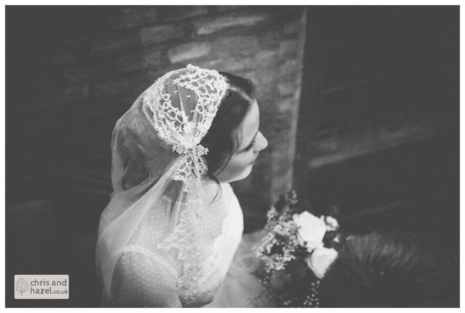 ben frankie bride groom on stairs wedding photographer merchant adventurers hall york wedding photography bride and groom christmas tree wedding winter chris and hazel wedding photography york
