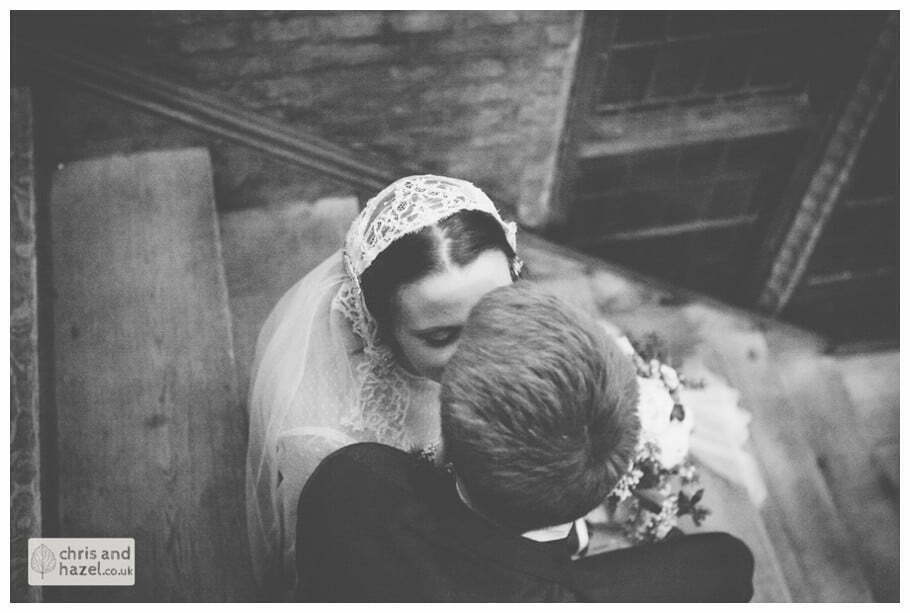 ben rankie bride groom on stairs wedding photographer merchant adventurers hall york wedding photography bride and groom christmas tree wedding winter chris and hazel wedding photography york