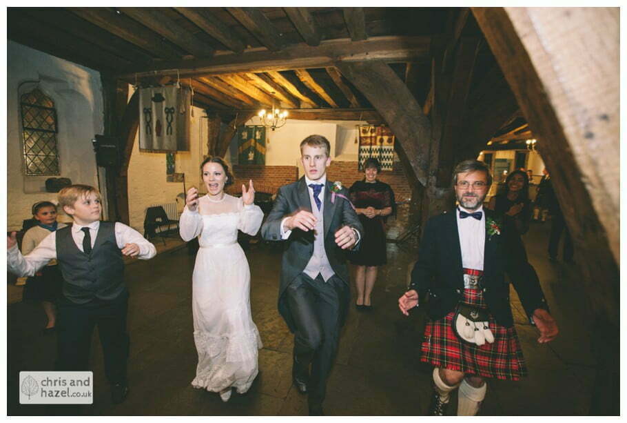 ceilidh band bride groom first dance guests dancing ben frankie wedding photographer merchant adventurers hall york wedding photography bride and groom christmas wedding winter chris and hazel wedding photography york