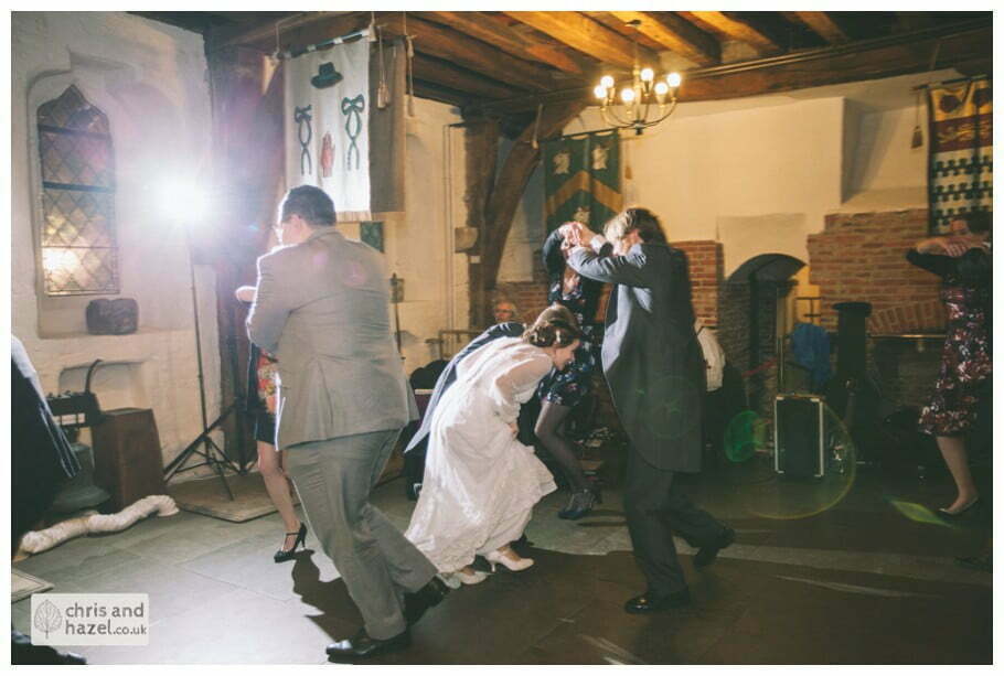 ceilidh band first dance guests dancing ben frankie wedding photographer merchant adventurers hall york wedding photography bride and groom christmas wedding winter chris and hazel wedding photography york