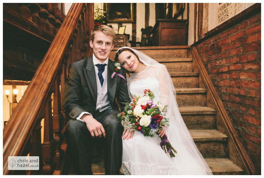 stairs staircase bride groom ben charig frankie wedding photographer merchant adventurers hall york wedding photography bride and groom christmas wedding winter chris and hazel wedding photography york