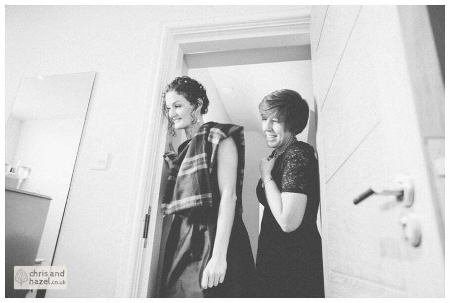 bride with bridesmaids getting ready preparations the apartment at purey cust house precentors court york city centre documentary wedding photography ben frankie wedding photographer york wedding photography wedding winter chris and hazel wedding photography york