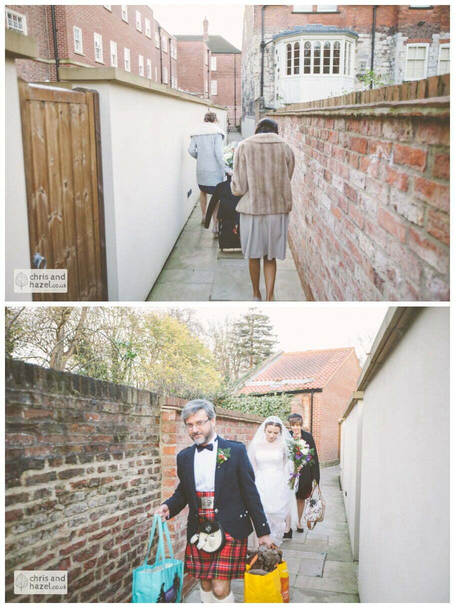 bride and bridesmaids the apartment at purey cust house precentors court wedding car york city centre heslington church merchant adventurers hall documentary wedding photography ben frankie wedding photographer heslington church wedding york wedding photography wedding winter chris and hazel wedding photography york