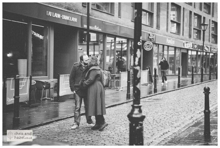 urban rain city corn exchange cobbled street cloth hall leeds pre wedding photography engagement session photographer leeds lee osbourne lois dyer