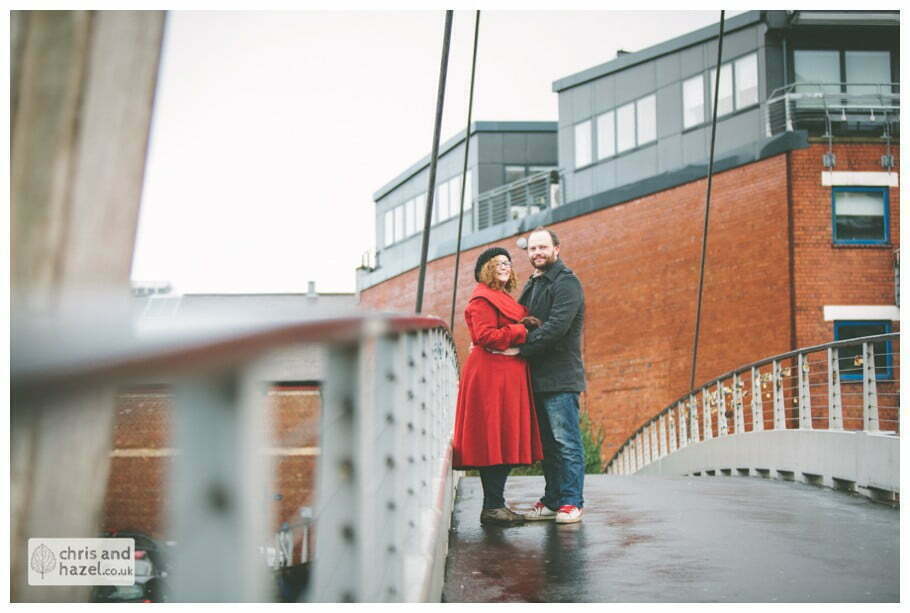 urban rain city clarence dock bridge leeds pre wedding photography engagement session photographer leeds lee osbourne lois dyer